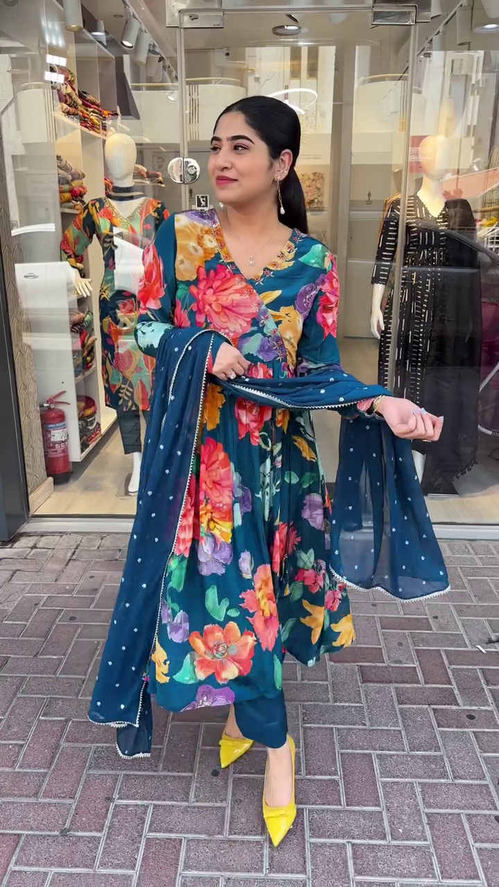 Navy Blue Floral Printed Anarkali Kurta Set with Matching Dupatta and Pants Featuring Vibrant Multicolor Blooms, Sequin Accents, and Stylish Yellow Heels for a Bold Festive Look