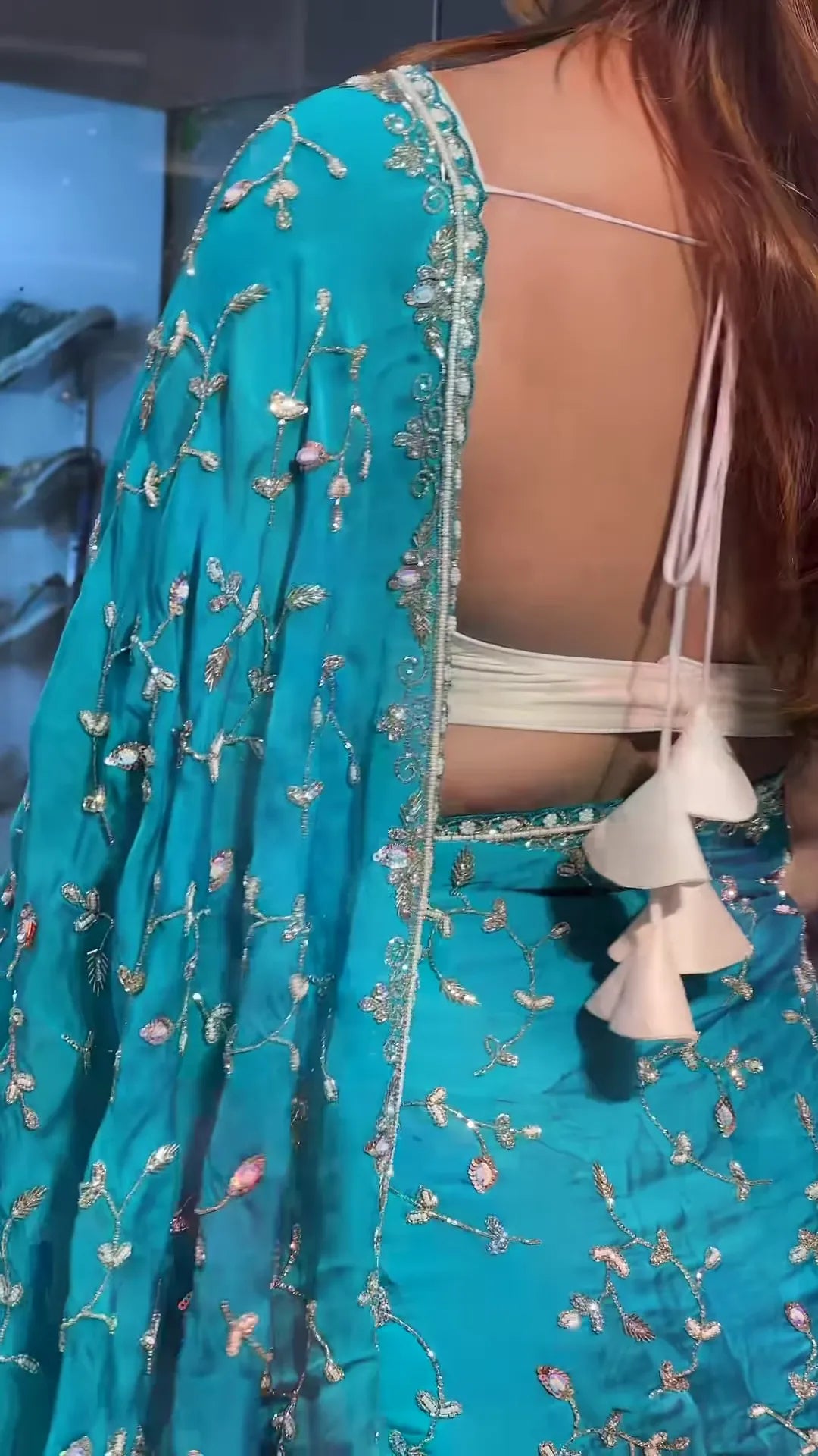 Elegant Turquoise Sari Adorned with Delicate Silver Embroidery