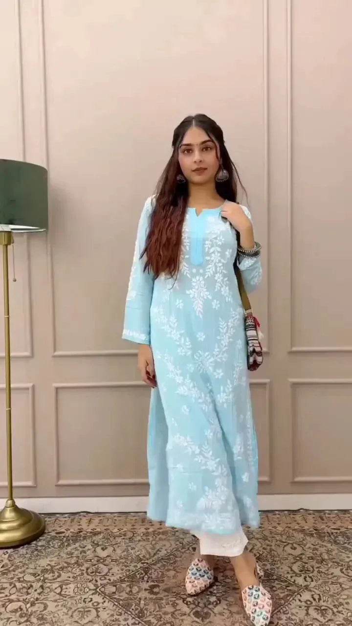 Light Blue Floral Embroidered Kurti with Bell Sleeves and Matching Accessories for a Chic Traditional Look