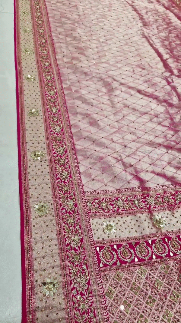 Designer Soft Net Pink Saree with Heavy Mirror Work, Intricate Embroidery, Stone Detailing, and Embellished Floral Borders with Tassel Pallu – Ideal for Wedding and Festive Occasions
