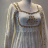 Off-White Georgette Anarkali Suit with Intricate Golden Embroidery, Sequins Detailing, Flared Hem, Square Neckline, Full Sleeves, and Matching Embellished Dupatta – Perfect for Festive and Wedding Occasions